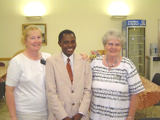 Sisters Markham and Huff with Brigham Johnson